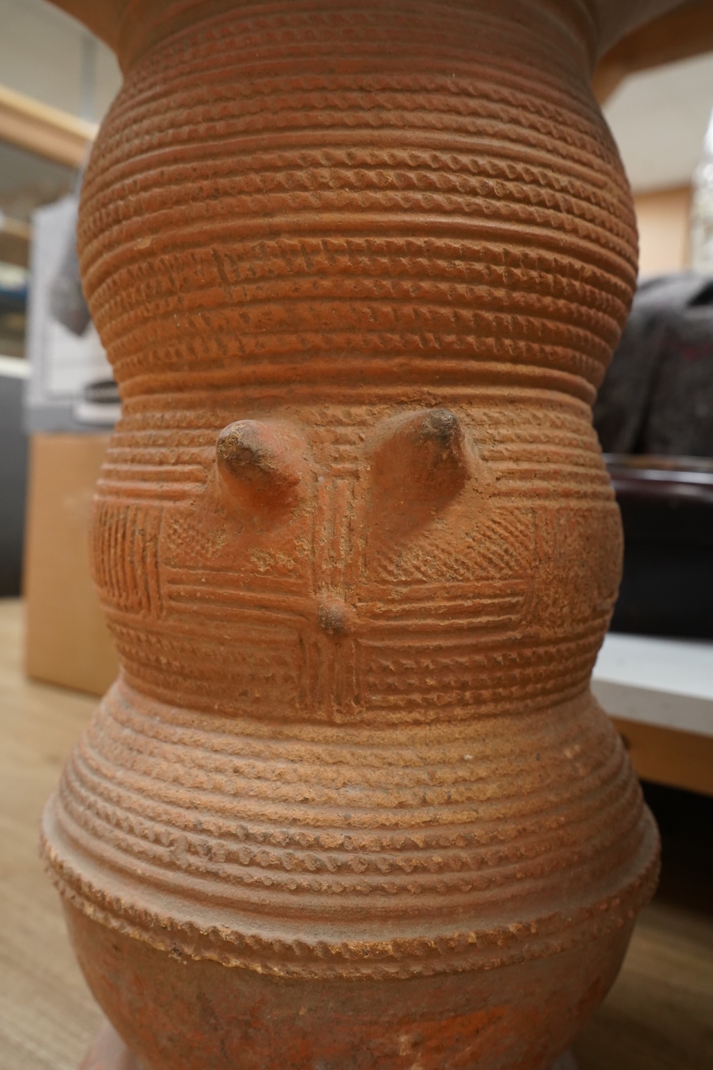 African art - a 20th century Nigerian terracotta nupe pot support, 51cm